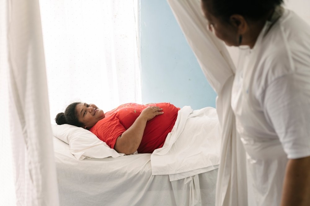 A young woman prior to accessing her first pap-smear via a pop-up community clinic organised by TFHA.
